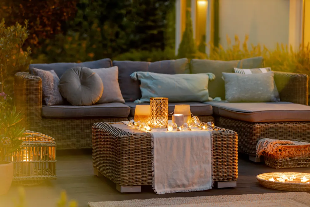 Evening On A Modern Designed Cozy Terrace With Sofa And