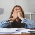 Young Asian Woman Cover Her Face After Stressed With Monthly
