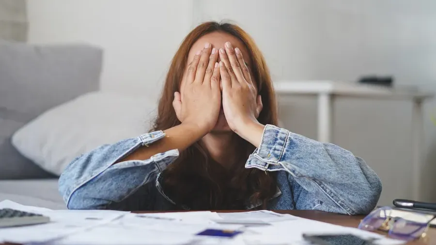 Young Asian Woman Cover Her Face After Stressed With Monthly