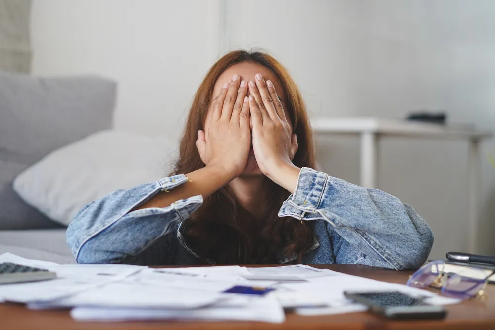 Young Asian Woman Cover Her Face After Stressed With Monthly