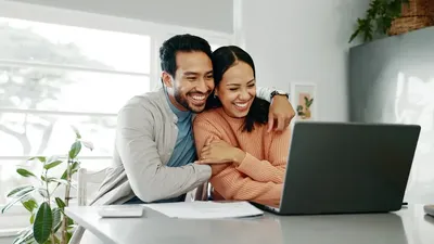 Happy Couple Paperwork And Hug With Laptop For Budget Paying