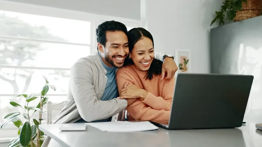 Happy Couple Paperwork And Hug With Laptop For Budget Paying